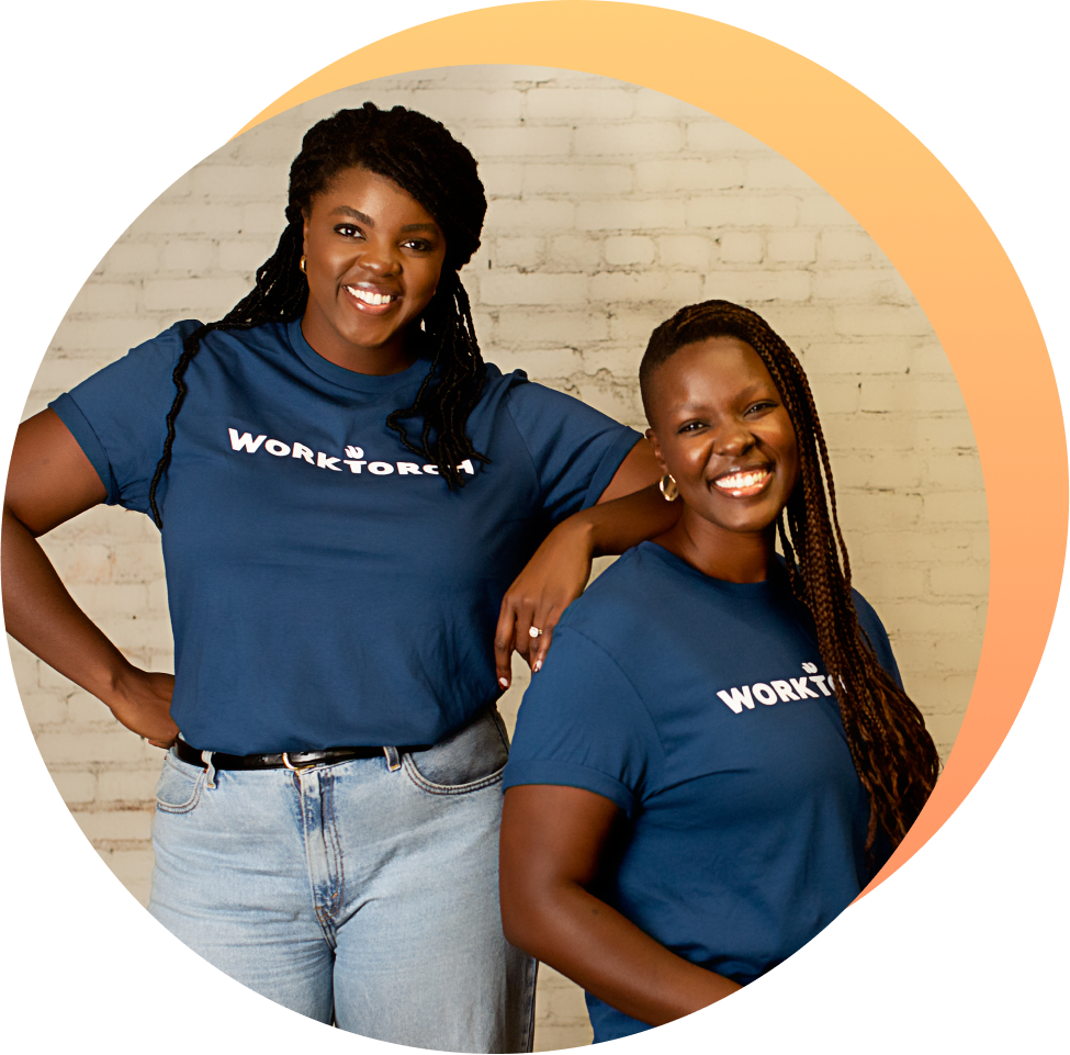 Angela Muhwezi-Hall standing and Deborah Gladney sitting for a portrait photo